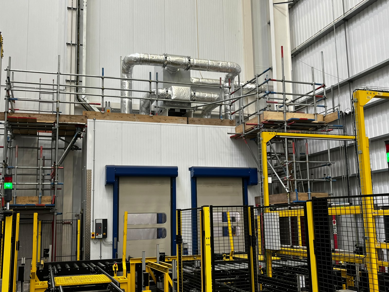 Industrial scaffold providing access to the top of an airlock at Butternut Box, Doncaster